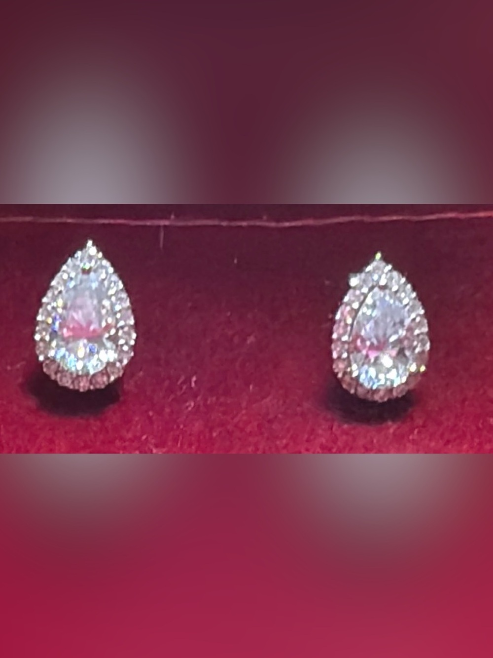 Sterling silver, pear-shaped halo moissanite earrings. 2.33 TCW